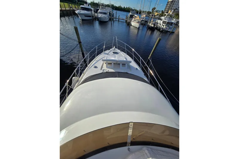 Slide: The Image of Sunseeker Manhattan 48 yacht docked at marina, 1997 model, aerial view. - 10