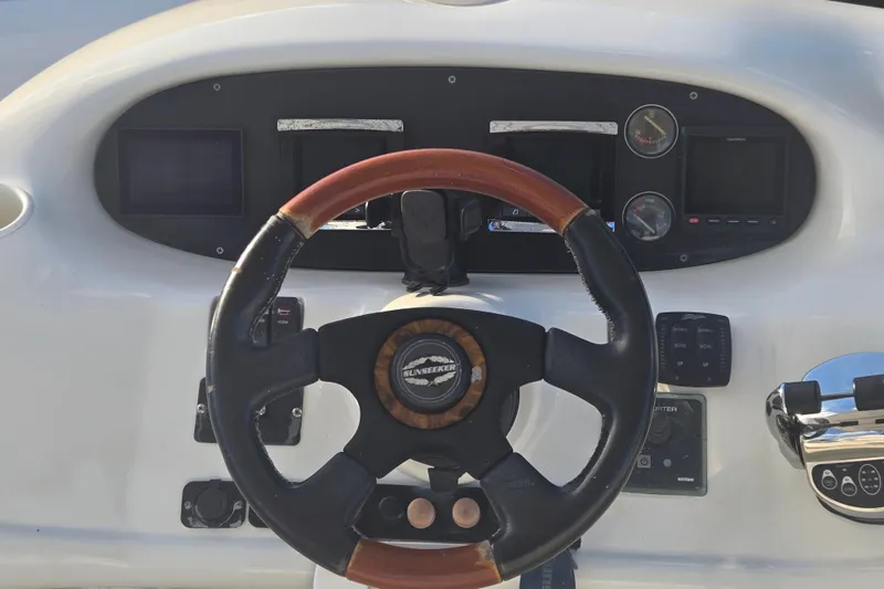 Slide: The Image of Steering wheel and dashboard of 1997 Sunseeker Manhattan 48 yacht. - 15