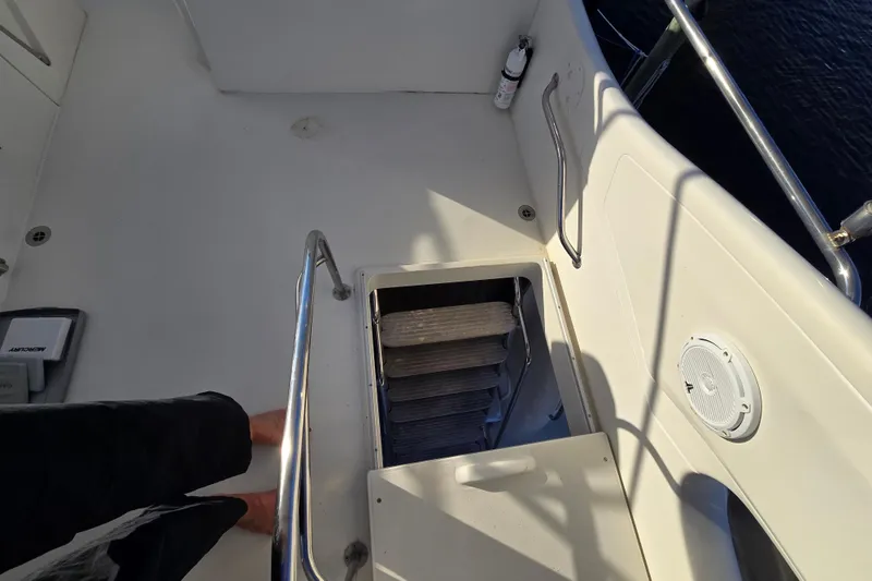 Slide: The Image of Staircase on 1997 Sunseeker Manhattan 48 yacht deck, featuring safety railings. - 22