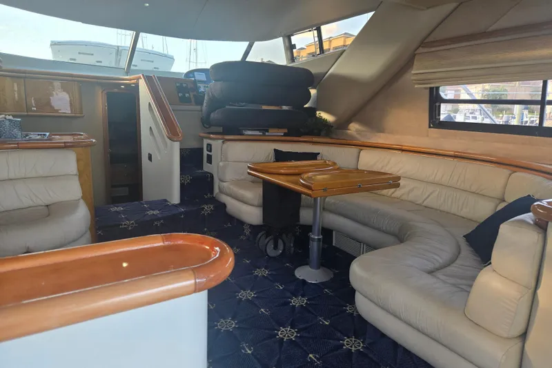 Slide: The Image of Luxurious interior of 1997 Sunseeker Manhattan 48 yacht with plush seating and elegant design. - 47