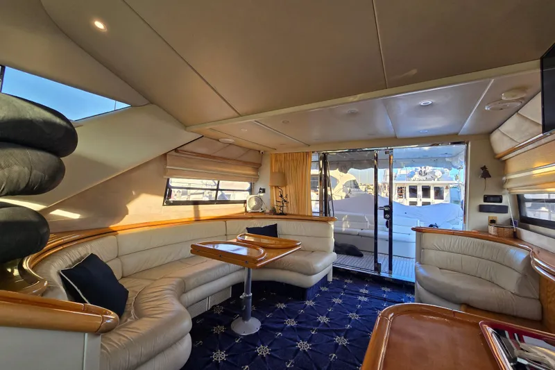 Slide: The Image of Luxurious interior of a 1997 Sunseeker Manhattan 48 yacht with elegant seating and decor. - 60