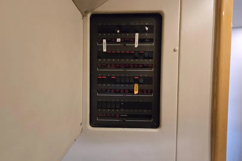 Slide: The Image of Electrical panel inside a 1997 Sunseeker Manhattan 48 yacht. - 69