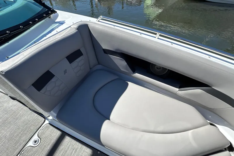 Slide: The Image of 2023 Four Winns HD5 OB boat interior with sleek gray seating and modern design. - 25