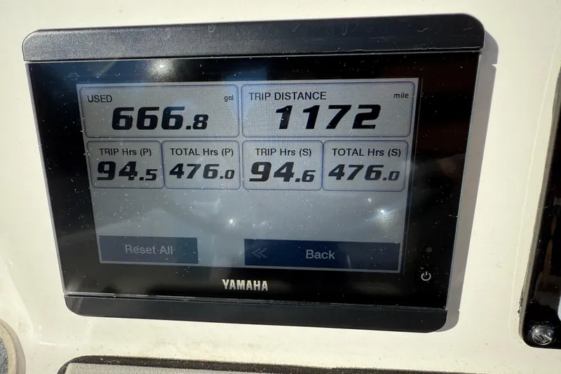 Slide: The Image of Yamaha display showing fuel usage and trip distance on 2022 Sea Fox 288 Commander. - 15