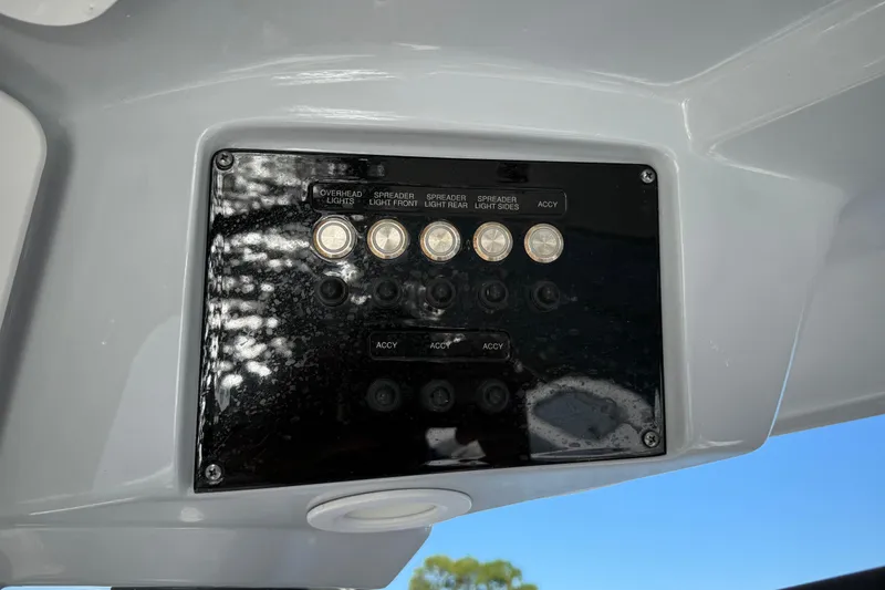 Slide: The Image of Control panel of 2022 Sea Fox 288 Commander boat with labeled switches. - 20