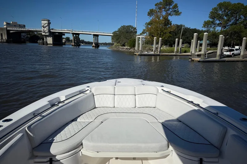 Slide: The Image of 2022 Sea Fox 288 Commander boat interior with bridge and dock view. - 23