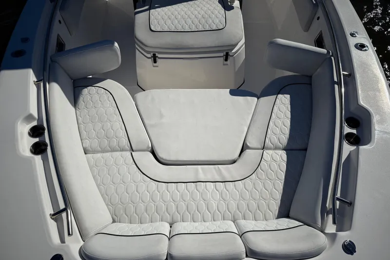 Slide: The Image of 2022 Sea Fox 288 Commander boat interior with cushioned seating and storage. - 24