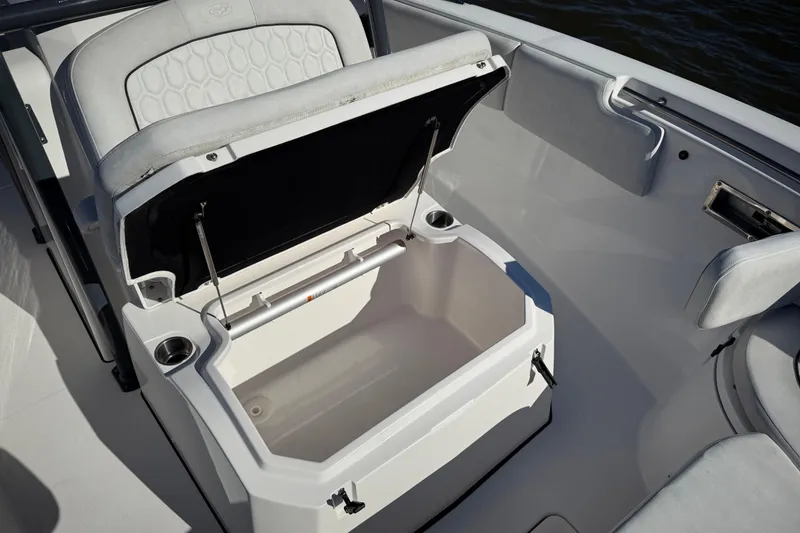 Slide: The Image of 2022 Sea Fox 288 Commander boat with open storage compartment and seating. - 30