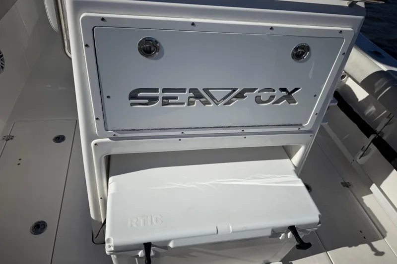 Slide: The Image of 2022 Sea Fox 288 Commander boat interior with branded storage compartment. - 32
