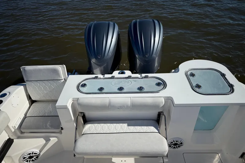 Slide: The Image of 2022 Sea Fox 288 Commander boat with dual engines and seating, on water. - 35