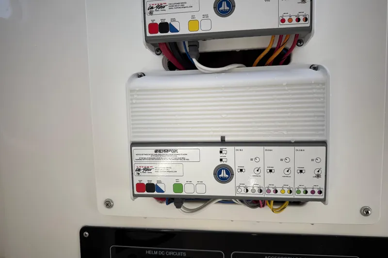 Slide: The Image of Electrical panel on a 2022 Sea Fox 288 Commander boat, featuring wiring and controls. - 40