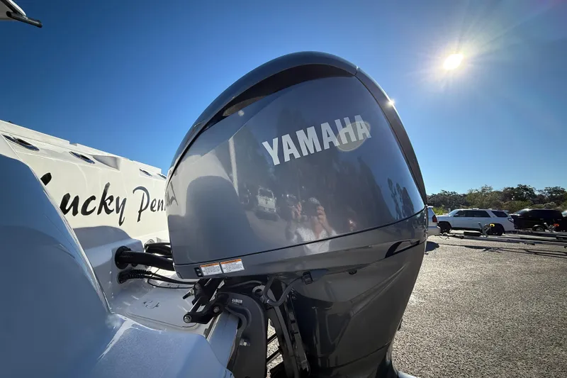 Slide: The Image of Yamaha engine on 2022 Sea Fox 288 Commander boat under bright sun. - 5