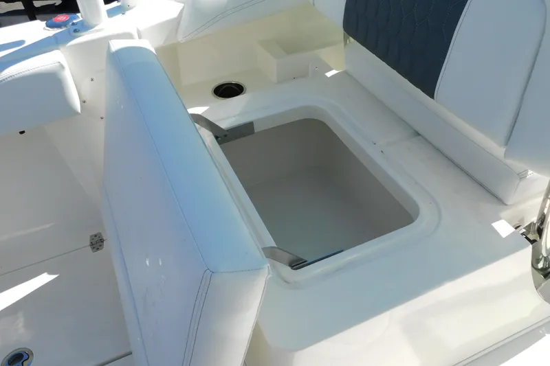Slide: The Image of 2026 Cobia 240 Dual Console boat deck with sleek gray flooring. - 34