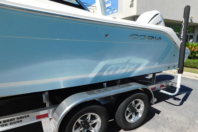 Slide: The Image of Manufacturer Provided Image: 2025 Cobia 240 Dual Console boat interior bathroom with sink and toilet. - 5