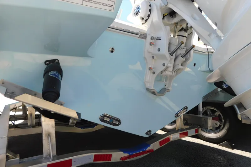 Slide: The Image of Steering console of 2026 Cobia 240 Dual Console boat with modern displays. - 51