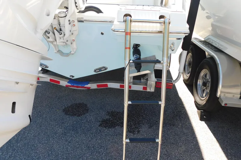 Slide: The Image of 2026 Cobia 240 Dual Console with Yamaha 300 V6 outboard engine. - 53