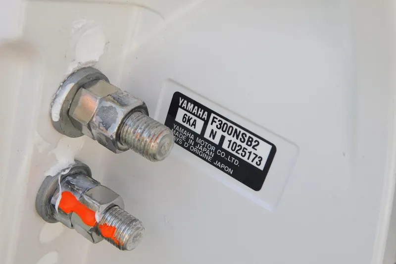 Slide: The Image of 2026 Cobia 240 Dual Console boat with sleek deck design and stainless steel fittings. - 62