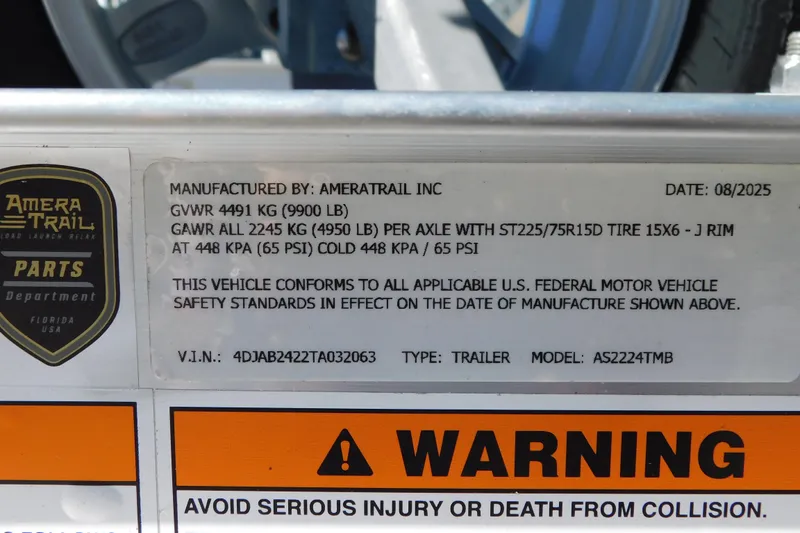 Slide: The Image of Close-up of Yamaha engine bolts and label on 2026 Cobia 240 Dual Console. - 63