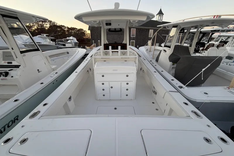 Slide: The Image of 2025 Regulator 31 boat interior with center console and storage compartments. - 19