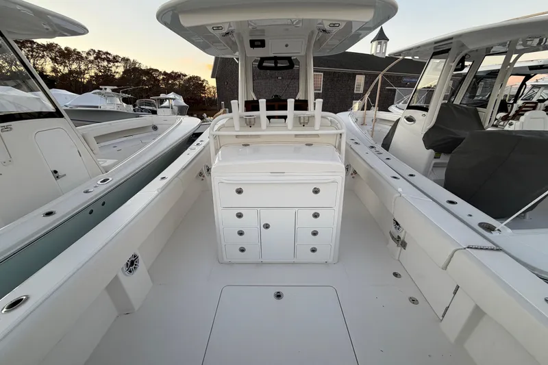 Slide: The Image of 2025 Regulator 31 boat interior with sleek white design and ample storage space. - 20