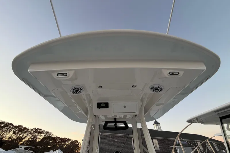 Slide: The Image of 2025 Regulator 31 boat's T-top with speakers and lights, viewed from below. - 28