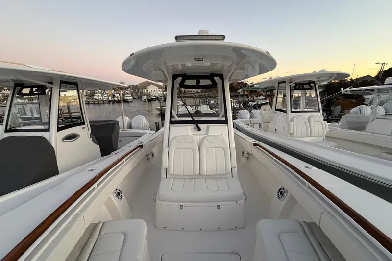 Slide: The Image of 2025 Regulator 31 boat interior at marina during sunset. - 38