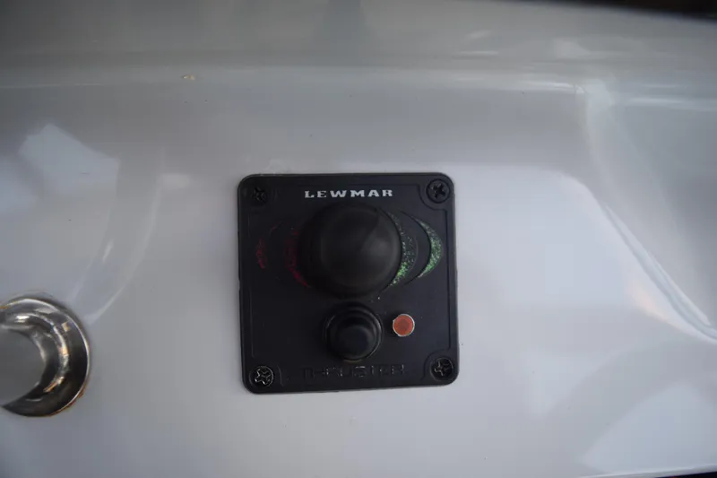 Slide: The Image of Lewmar control panel on 2021 Regal 26 XO boat dashboard. - 105