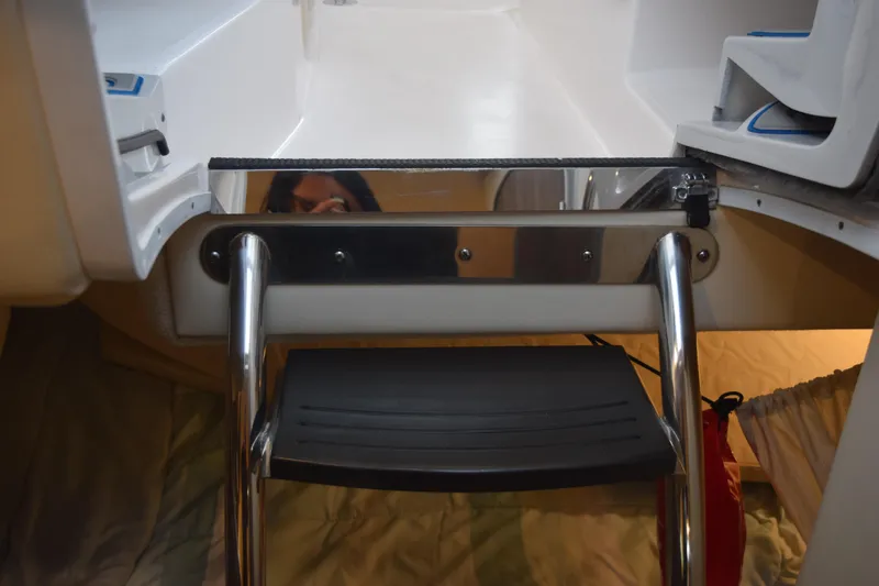 Slide: The Image of Interior view of 2021 Regal 26 XO boat with ladder and cabin entrance. - 109