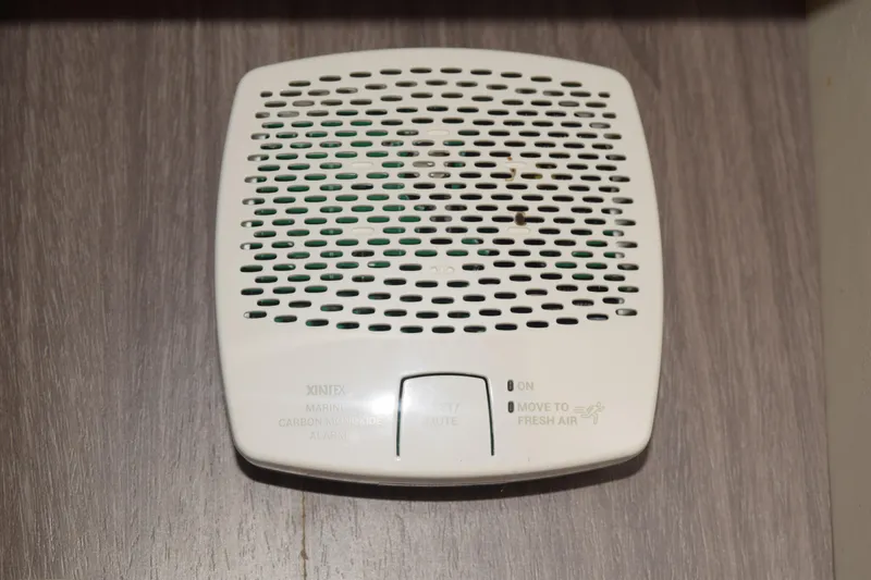 Slide: The Image of Carbon monoxide detector on 2021 Regal 26 XO boat interior wall. - 121
