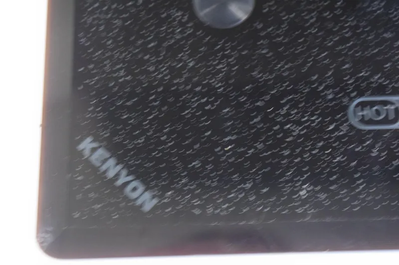 Slide: The Image of Close-up of Kenyon cooktop on 2021 Regal 26 XO boat. - 129