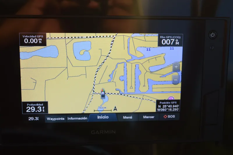 Slide: The Image of Garmin GPS display on 2021 Regal 26 XO boat showing navigation map and data. - 175