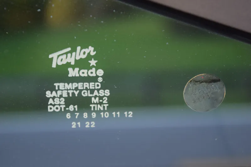 Slide: The Image of Taylor Made tempered safety glass on 2021 Regal 26 XO boat window. - 180