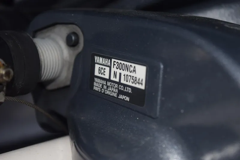 Slide: The Image of Close-up of Yamaha motor label on 2021 Regal 26 XO boat engine. - 19