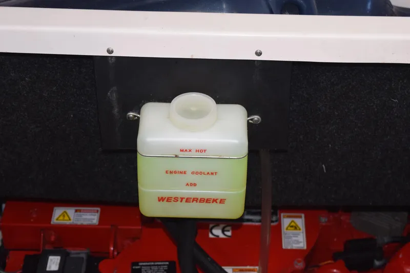 Slide: The Image of Engine coolant reservoir in a 2021 Regal 26 XO boat, labeled "Westerbeke." - 190