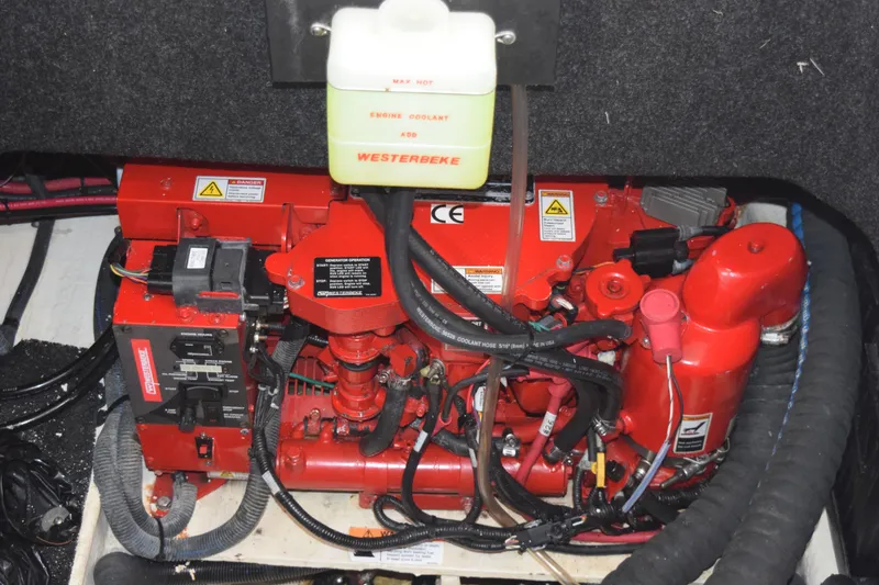 Slide: The Image of Engine compartment of a 2021 Regal 26 XO boat with Westerbeke generator. - 191