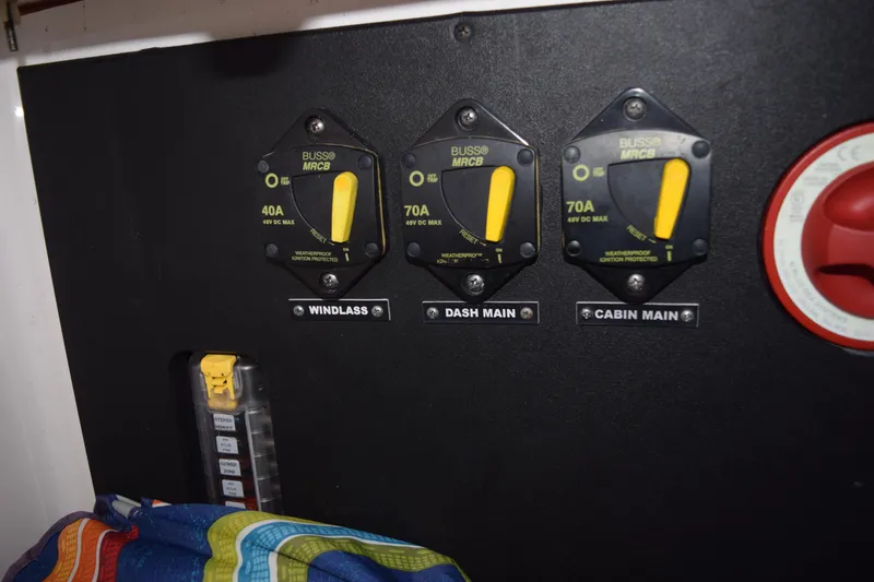 Slide: The Image of Electrical panel of 2021 Regal 26 XO boat with labeled circuit breakers. - 197