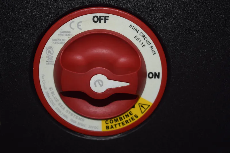 Slide: The Image of Red dual circuit battery switch on 2021 Regal 26 XO boat. - 199