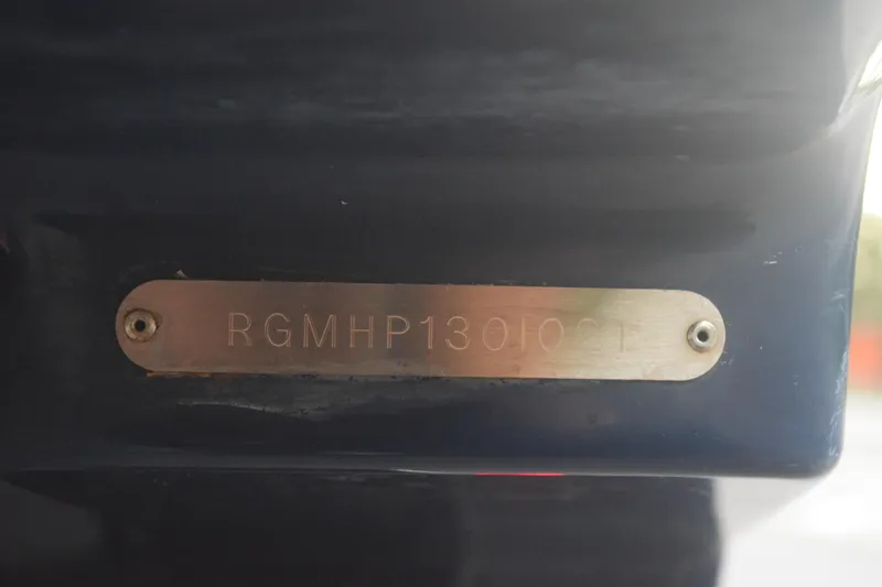 Slide: The Image of Hull identification number on 2021 Regal 26 XO boat, engraved on metal plate. - 21