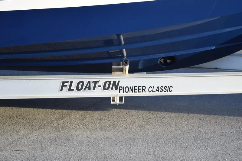 Slide: The Image of 2021 Regal 26 XO boat on Float-On Pioneer Classic trailer. - 228