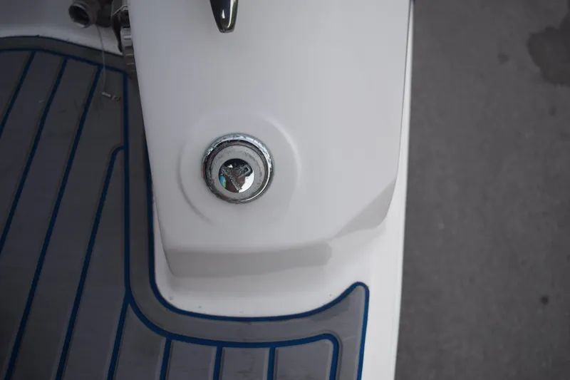 Slide: The Image of Close-up of a 2021 Regal 26 XO boat deck with chrome detail. - 34