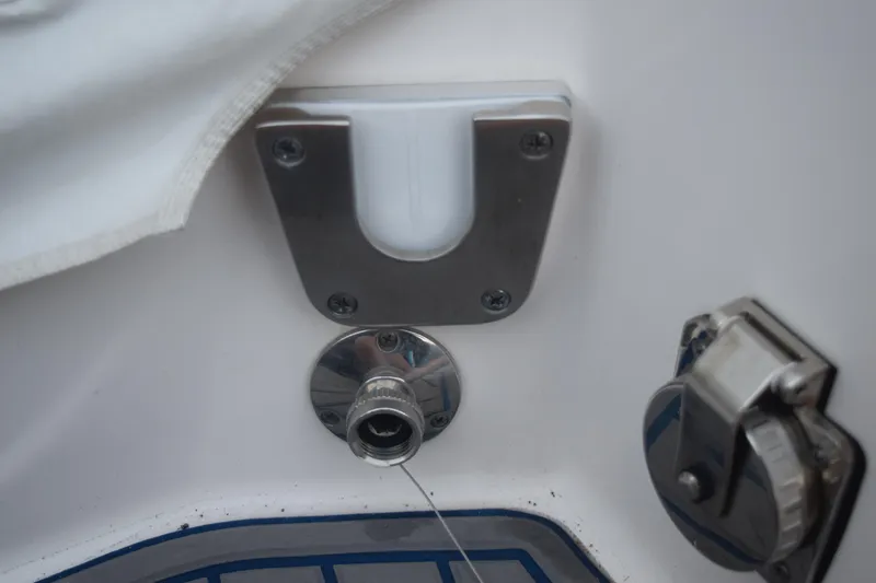 Slide: The Image of 2021 Regal 26 XO boat hardware detail, featuring stainless steel fittings and fixtures. - 40