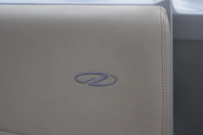 Slide: The Image of Beige leather seat with embroidered logo on 2021 Regal 26 XO boat. - 59