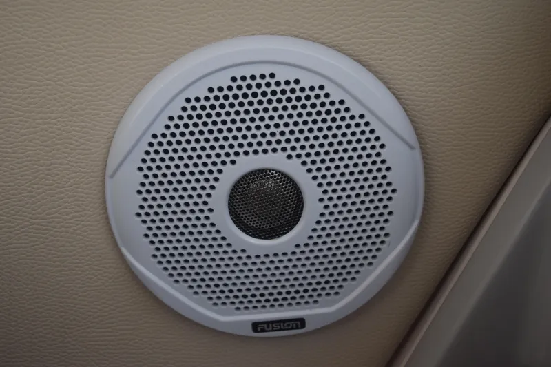 Slide: The Image of White Fusion speaker on 2021 Regal 26 XO boat interior. - 62