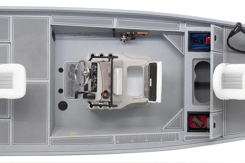 Slide: The Image of Top view of 2026 G3 Bay 17 boat interior with steering console and storage compartments. - 25