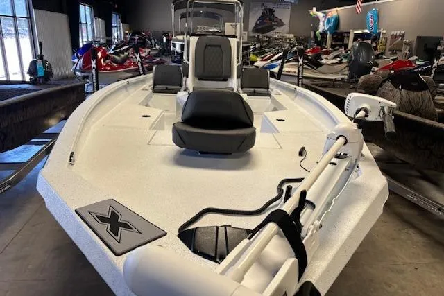 Slide: The Image of 2026 Xpress H22B Bay boat in showroom, featuring sleek design and modern equipment. - 3