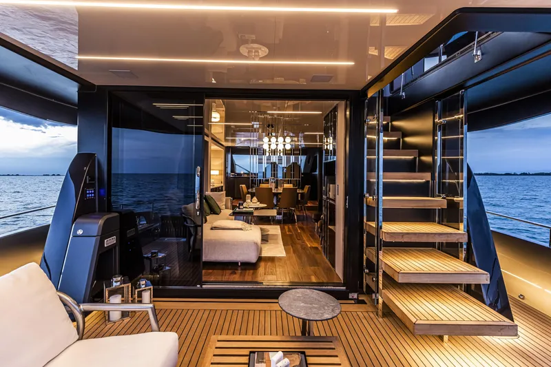 Slide: The Image of Luxurious 2026 Cranchi Sessantasette 67 yacht interior with elegant seating and ocean view. - 10