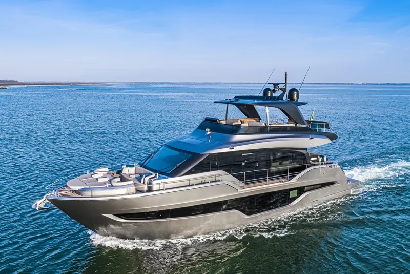 Slide: The Image of Luxury 2026 Cranchi Sessantasette 67 yacht cruising on open water. - 3