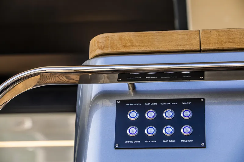 Slide: The Image of Control panel on 2026 Cranchi Sessantasette 67 yacht, featuring various light and table controls. - 34