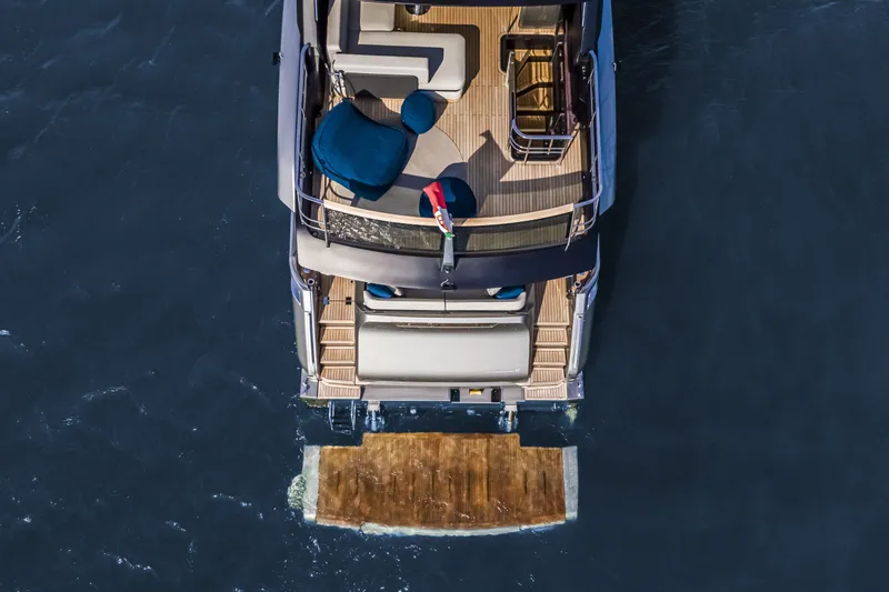 Slide: The Image of Aerial view of 2026 Cranchi Sessantasette 67 yacht on open water. - 36
