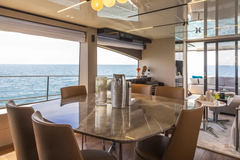 Slide: The Image of Luxurious interior of 2026 Cranchi Sessantasette 67 yacht with ocean view dining area. - 46